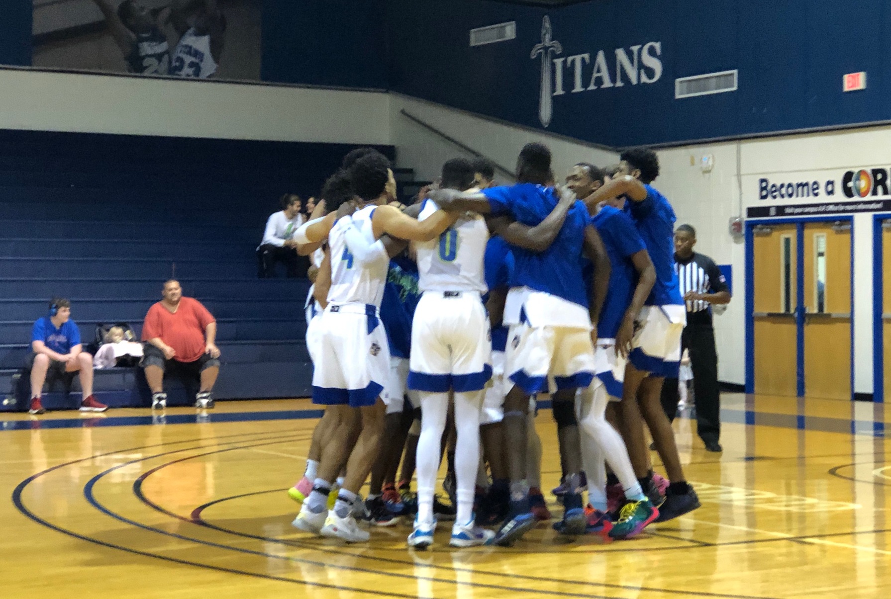 Men's basketball team punches ticket to state tournament with win