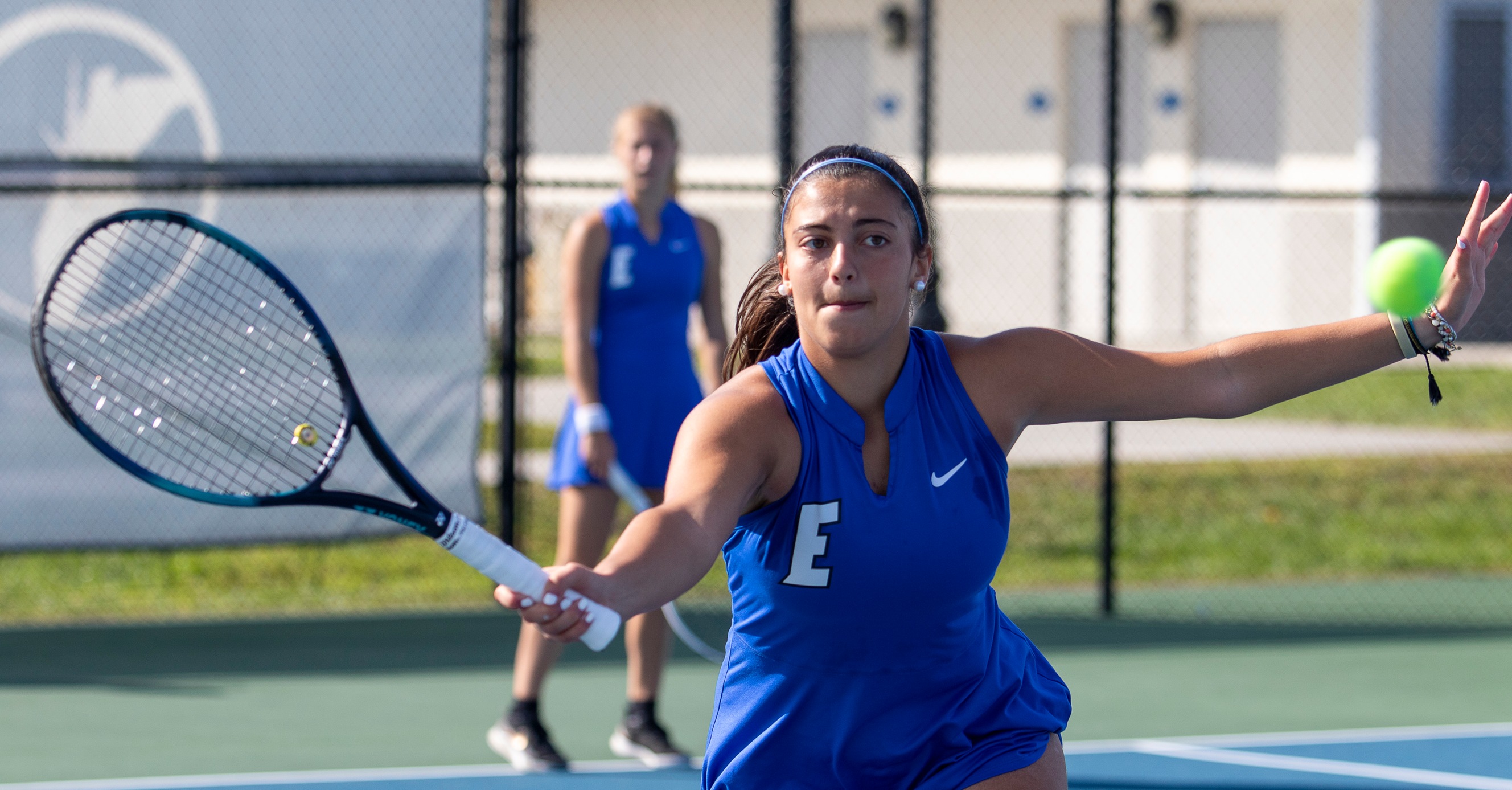 Women's tennis team opens with a win