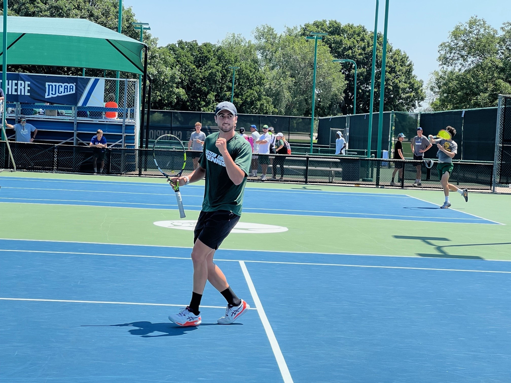 Men's tennis team tied for first after two days at national tournament