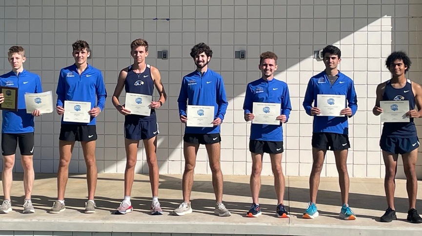 Men's cross country team wins Region 8 Division I title
